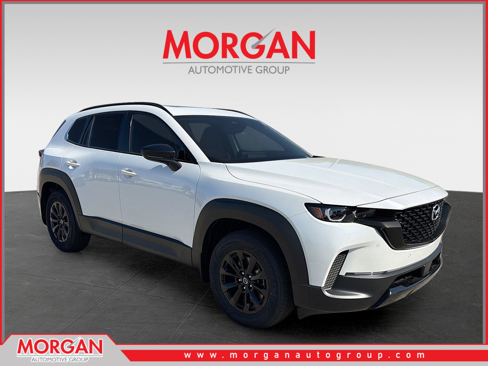 2026 Mazda CX-50 Hybrid Premium in Wind Chill Pearl — front three-quarter view