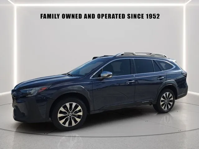 2023 Subaru Outback Touring XT in Cosmic Blue Pearl — front three-quarter view