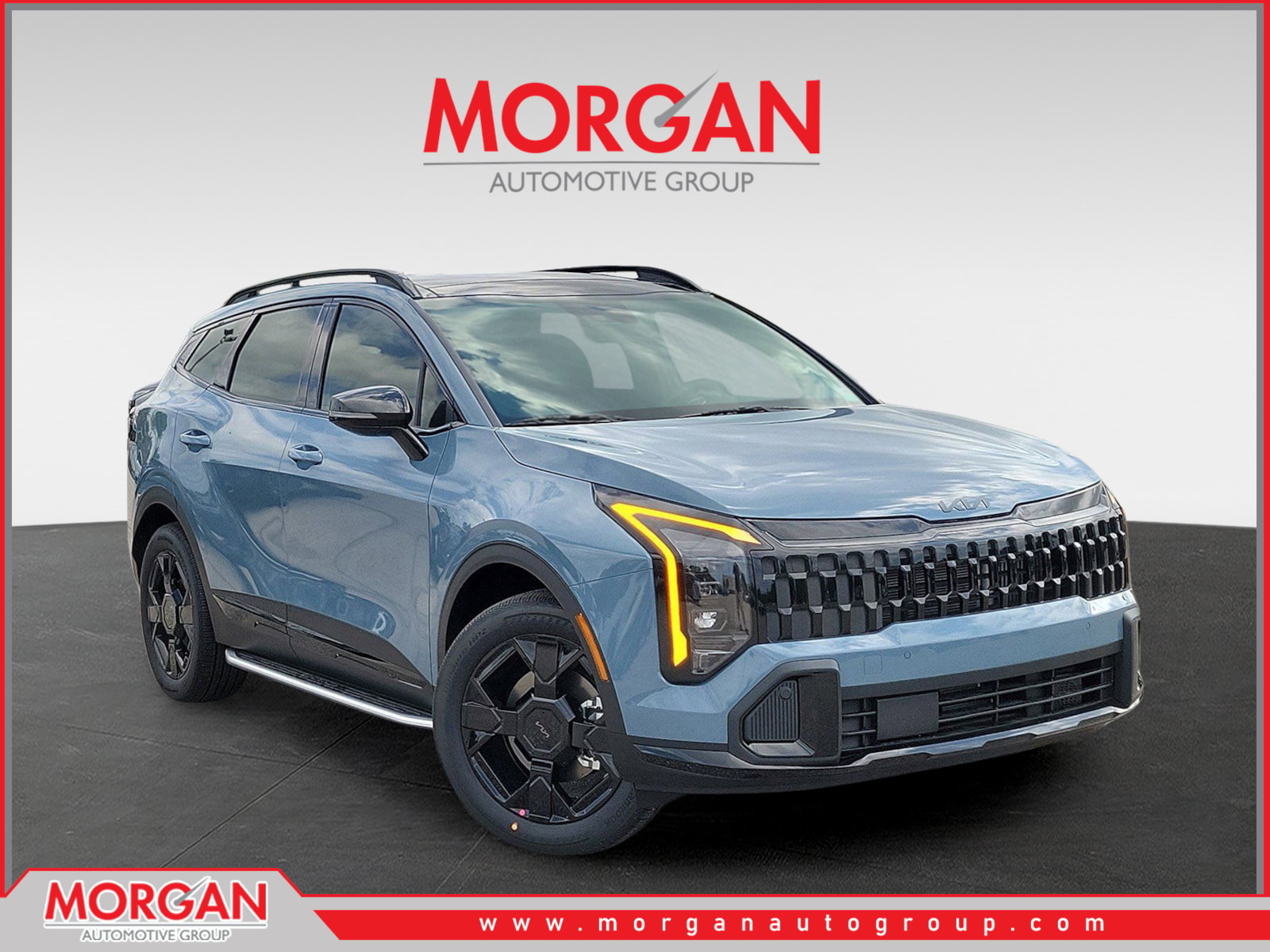 2026 Kia Sportage Hybrid X-Line in Heritage Blue — front three-quarter view