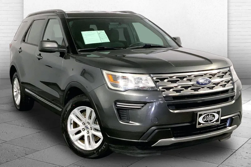 2018 Ford Explorer XLT in Magnetic — front three-quarter view