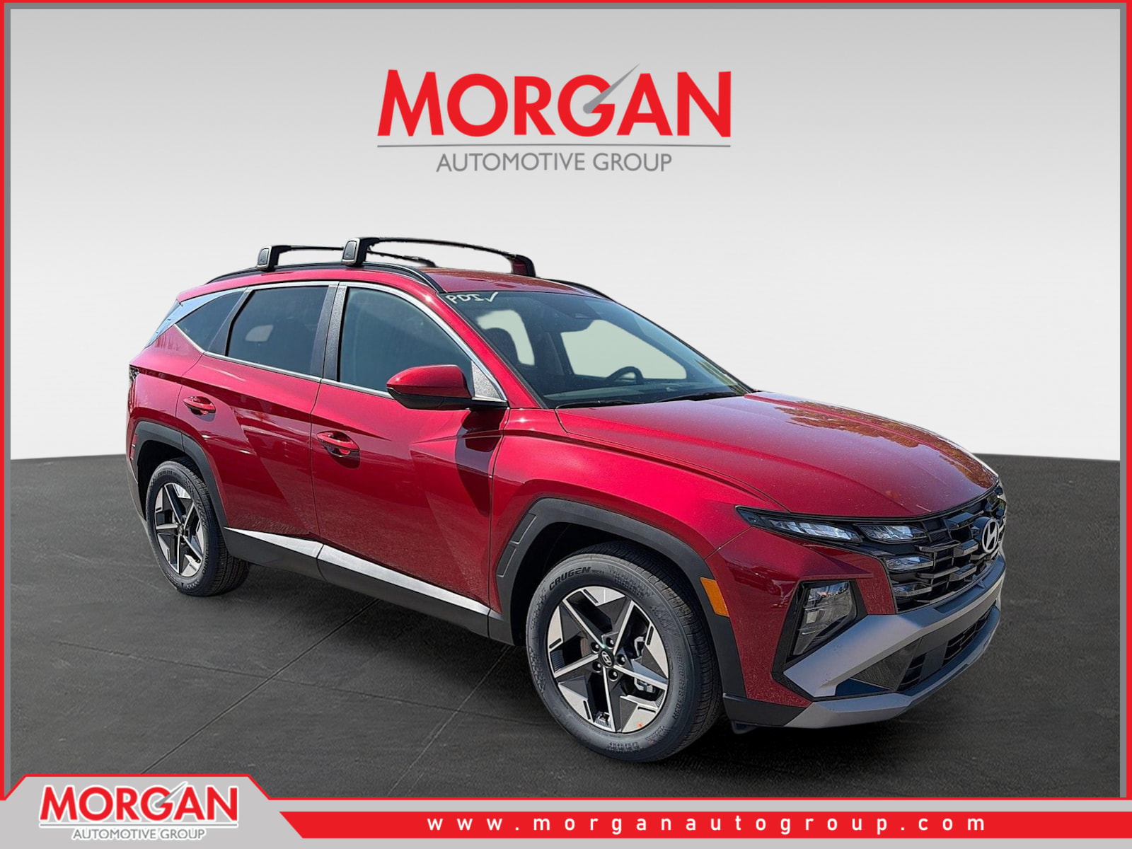 2026 Hyundai TUCSON SEL in Ultimate Red — front three-quarter view