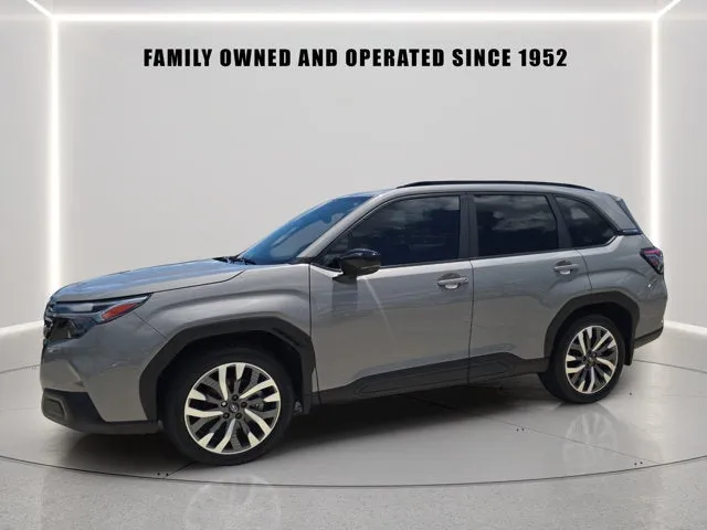 2025 Subaru Forester Touring in River Rock Pearl — front three-quarter view