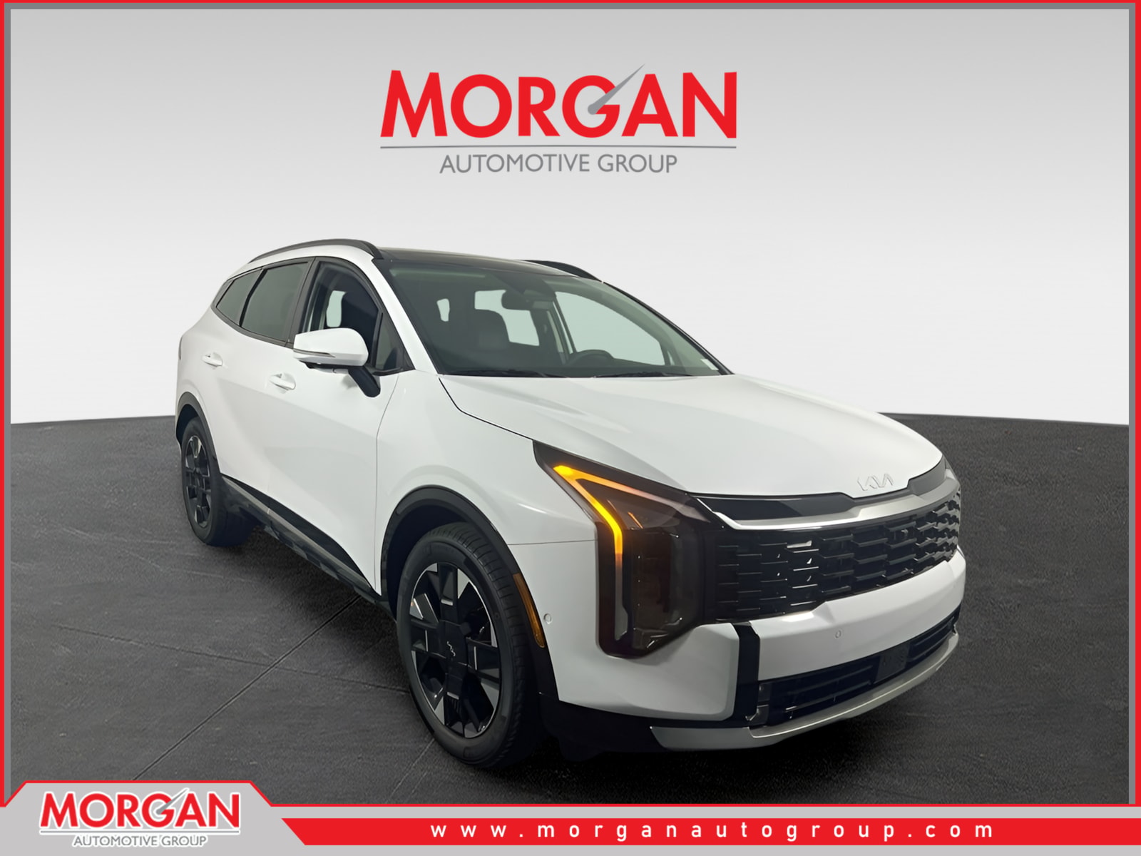 2026 Kia Sportage SX-Prestige in Glacial White Pearl — front three-quarter view