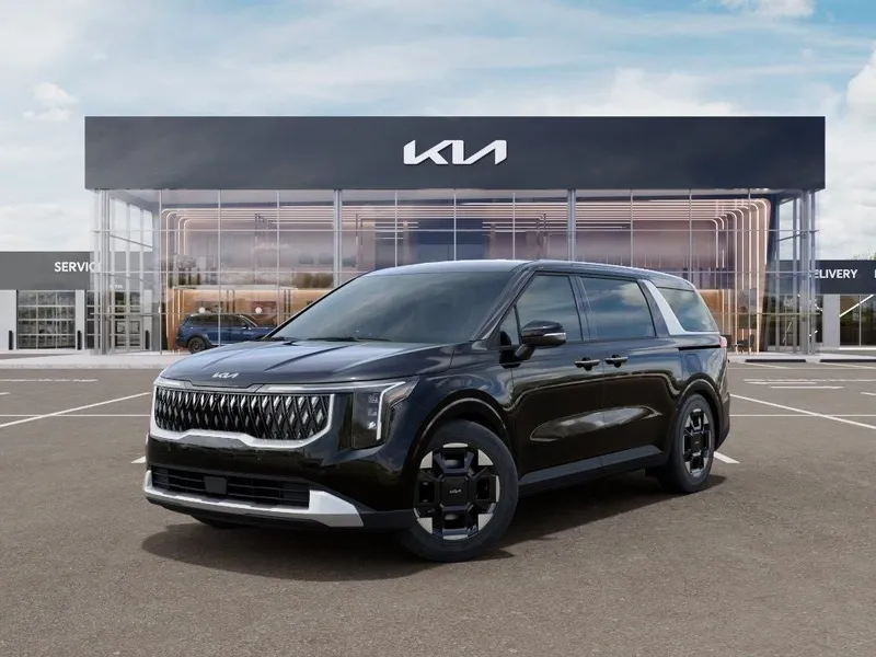 2026 Kia Carnival EX in Aurora Black Pearl — front three-quarter view