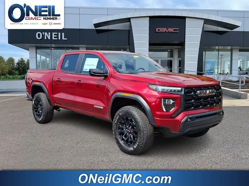 2026 GMC Canyon Elevation in Volcanic Red Tintcoat — front three-quarter view