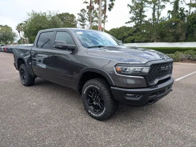 2026 RAM 1500 Rebel in Granite Crystal Metallic Clear-Coat Exterior Paint — front three-quarter view