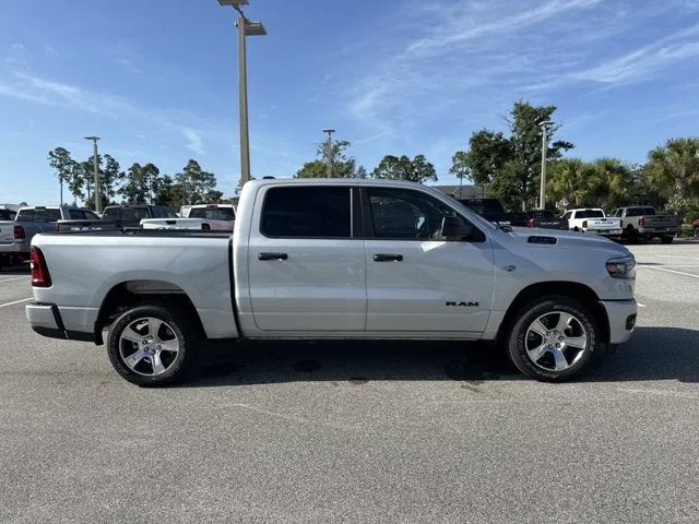 2026 RAM 1500 Express in Silver Zynith — front three-quarter view