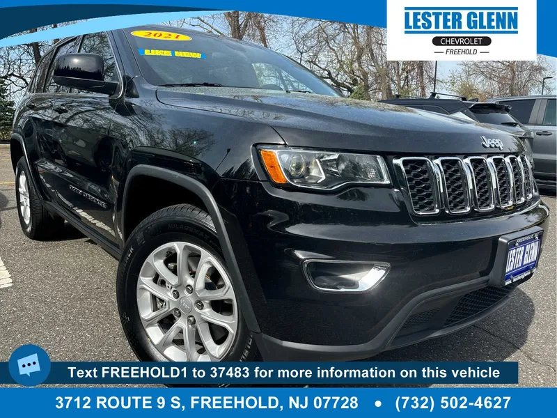 2021 Jeep Grand Cherokee Laredo E 4x4 in Black — front three-quarter view