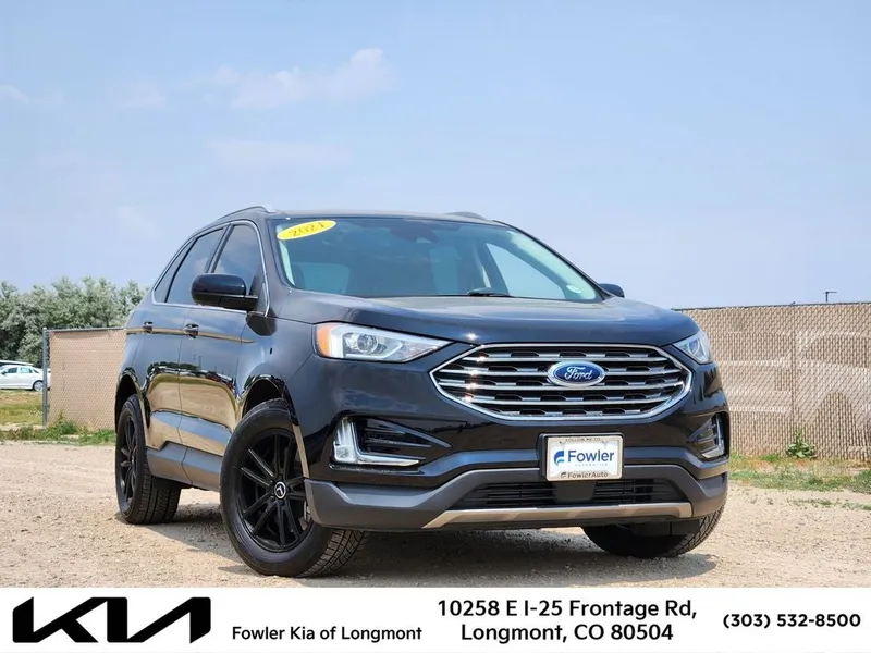 2021 Ford Edge SEL in Black Metallic — front three-quarter view