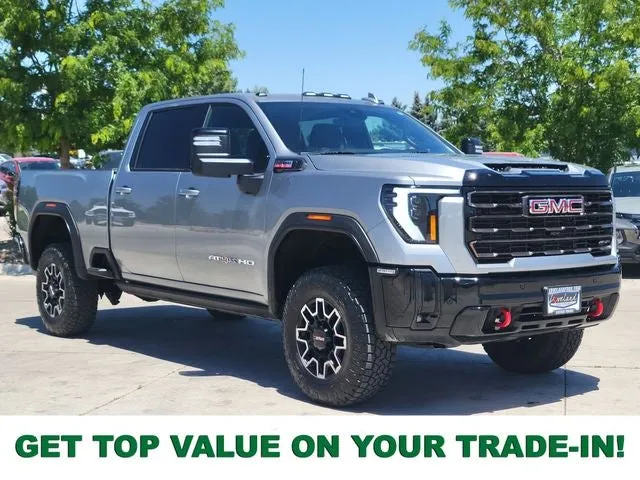 2025 GMC Sierra 2500HD AT4X in Sterling Metallic — front three-quarter view