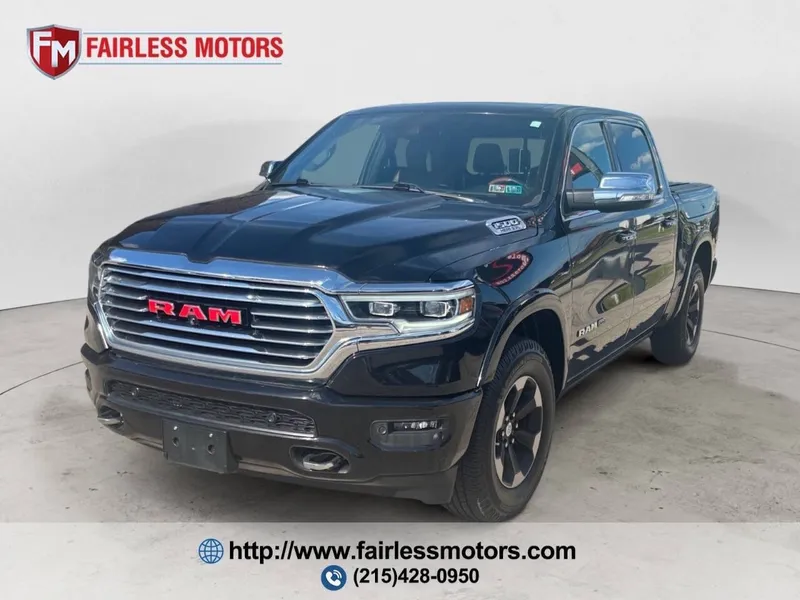 2020 RAM 1500 Laramie Longhorn 4x4 4dr Crew Cab 5.6 ft. SB Pickup in Diamond Black Crystal Pearl Coat — front three-quarter view