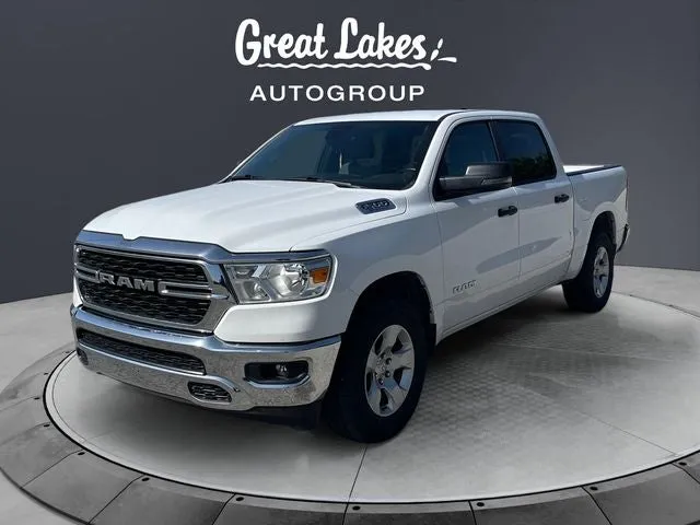 2023 RAM 1500 Big Horn/Lone Star in Bright White Clearcoat — front three-quarter view