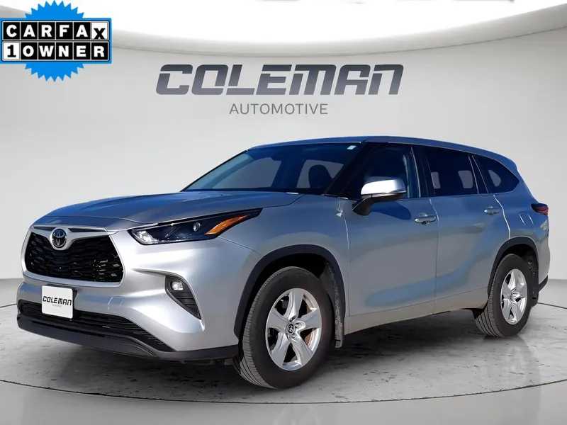 2024 Toyota Highlander LE in Silver — front three-quarter view
