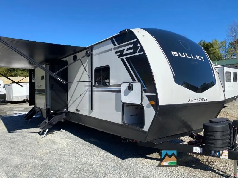 2026 Keystone RV Bullet 330BKQ — front three-quarter view