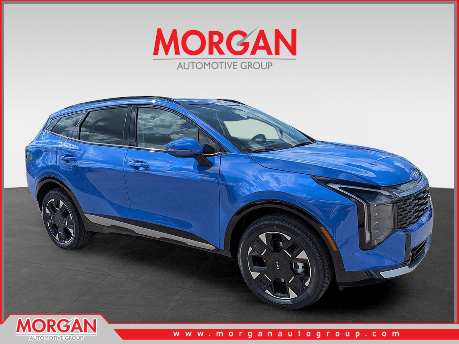 2026 Kia Sportage EX in Nebular Blue — front three-quarter view