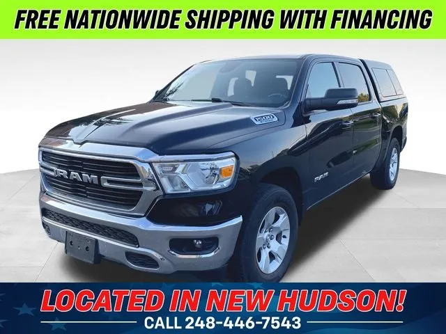 2022 RAM 1500 Big Horn/Lone Star in Diamond Black Crystal Pearlcoat — front three-quarter view