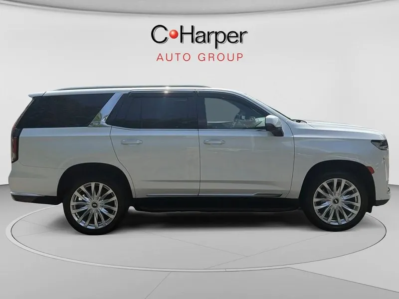 2022 Cadillac Escalade Luxury in Crystal White Tricoat — front three-quarter view