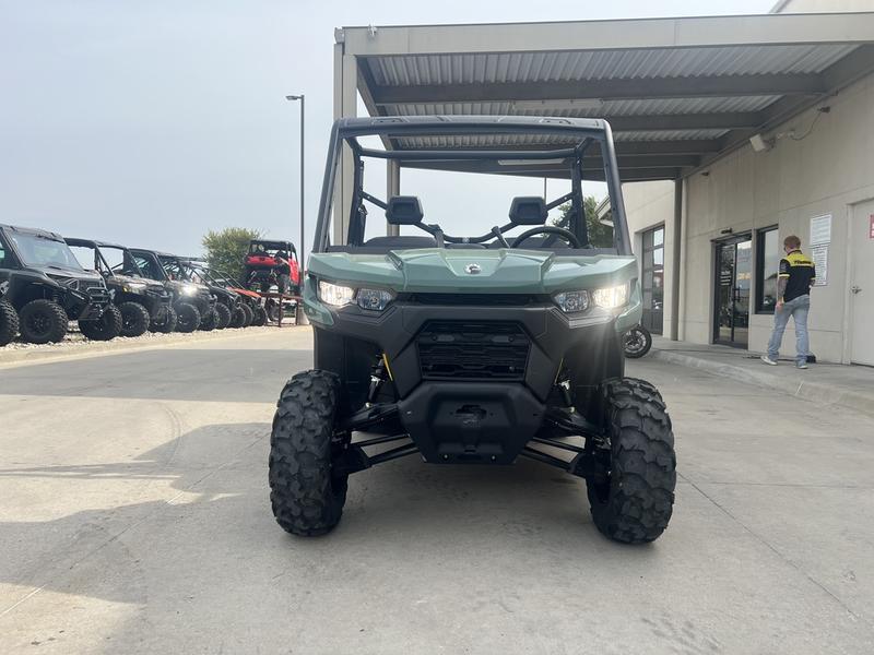 2025 Can-Am Defender HD7 in GREEN — front three-quarter view
