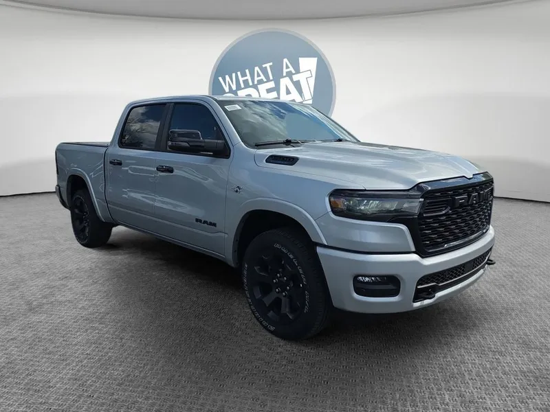 2026 RAM 1500 Big Horn/Lone Star in Silver Zynith — front three-quarter view