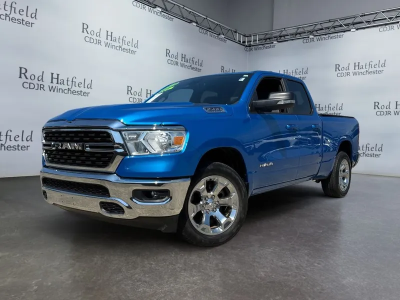 2022 RAM 1500 Big Horn Quad Cab 4x4 6'4' Box in Hydro Blue Pearlcoat — front three-quarter view