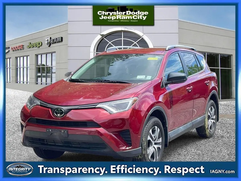 2018 Toyota RAV4 LE in Red — front three-quarter view