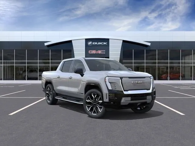 2026 GMC Sierra EV Denali Max Range in Thunderstorm Gray — front three-quarter view
