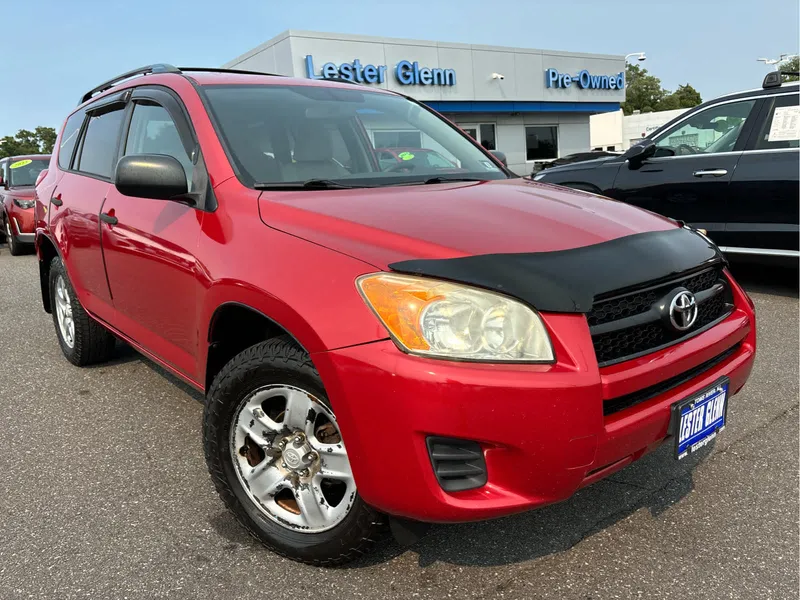 2009 Toyota RAV4 4WD 4dr 4-cyl 4-Spd AT (Natl) in Barcelona Red Metallic — front three-quarter view