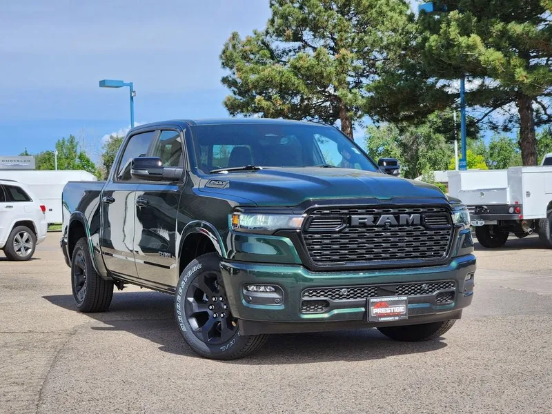 2026 RAM 1500 RAM 1500 BIG HORN CREW CAB 4X4 5'7' BOX in Serrano-Green Metallic Exterior Paint — front three-quarter view