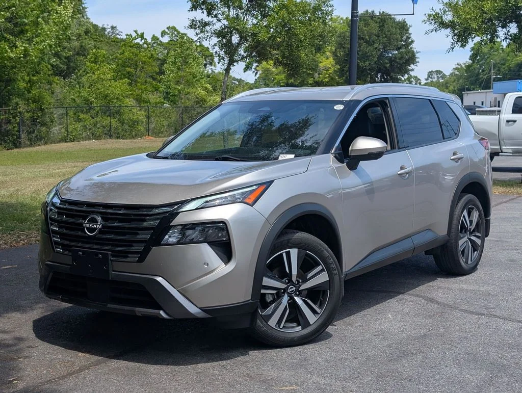 2024 Nissan Rogue SL in Gold — front three-quarter view