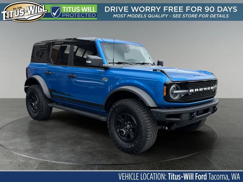 2024 Ford Bronco Wildtrak in Blue Metallic — front three-quarter view