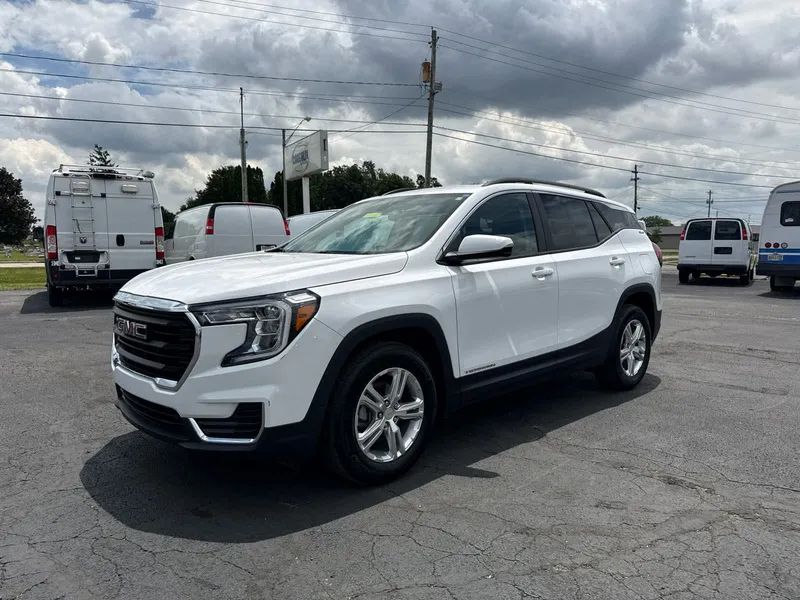 2024 GMC Terrain SLE in Summit White — front three-quarter view