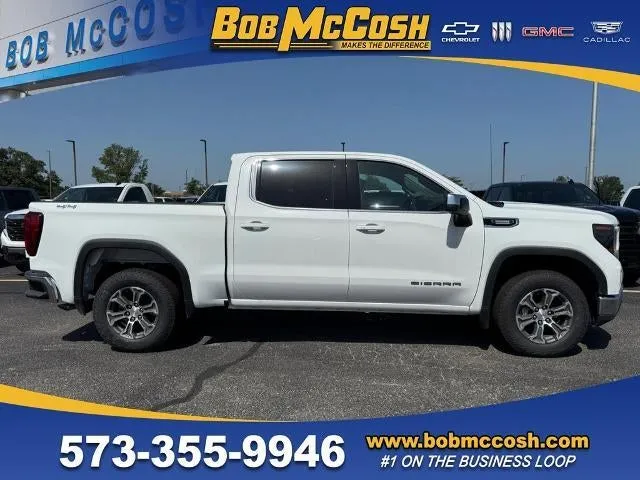 2026 GMC Sierra 1500 SLE in Summit White — front three-quarter view