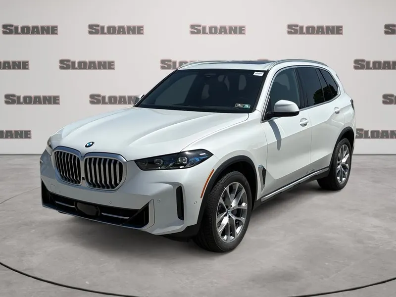 2026 BMW X5 xDrive40i in Mineral White Metallic — front three-quarter view