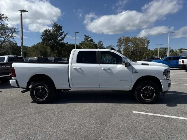 2026 RAM 2500 Laramie in Bright White Clearcoat — front three-quarter view