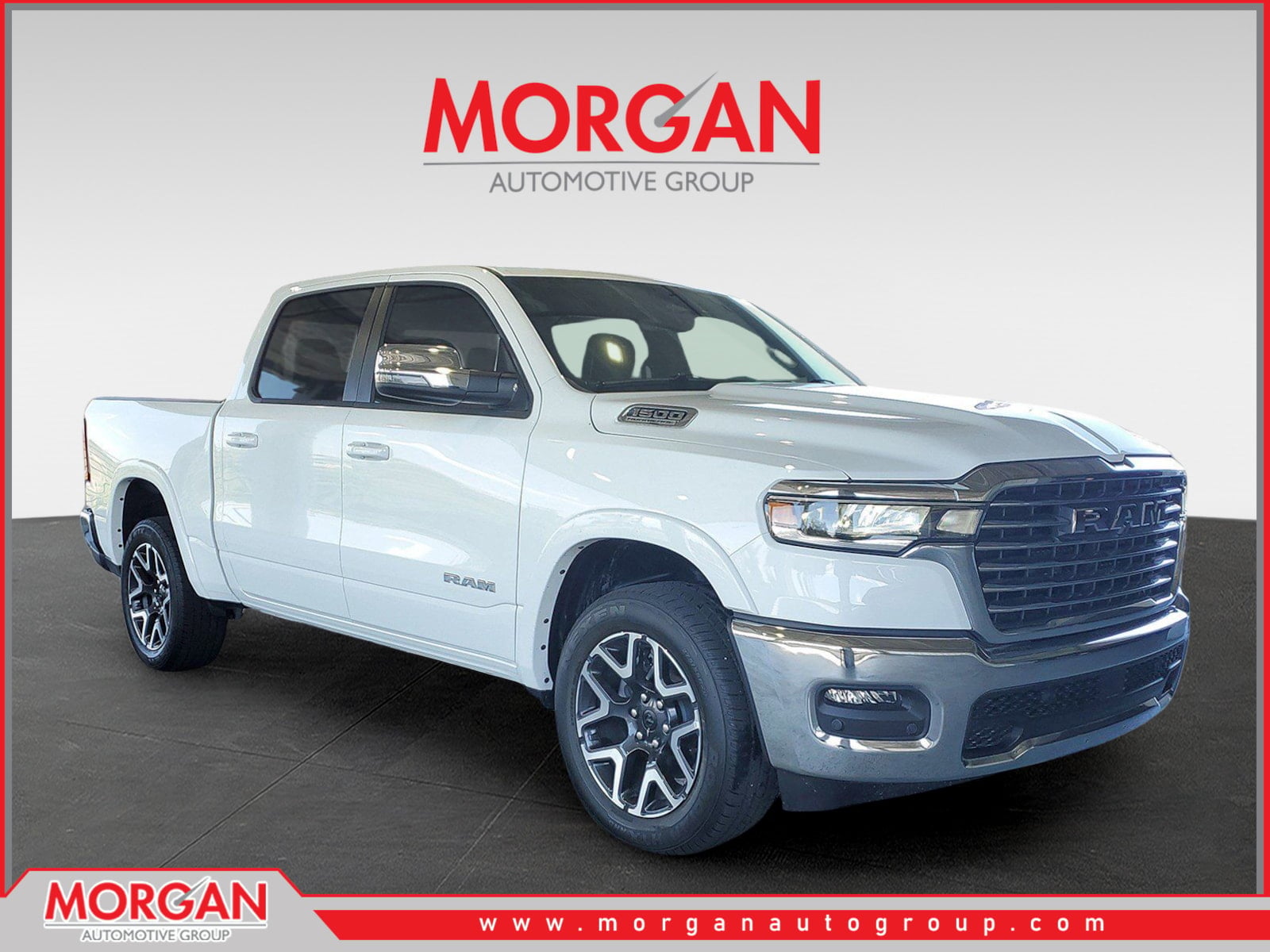 2026 Ram 1500 Laramie in Bright White Clearcoat — front three-quarter view