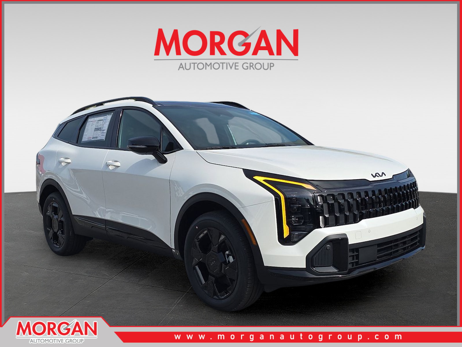 2026 Kia Sportage Hybrid X-Line in Snow White Pearl — front three-quarter view