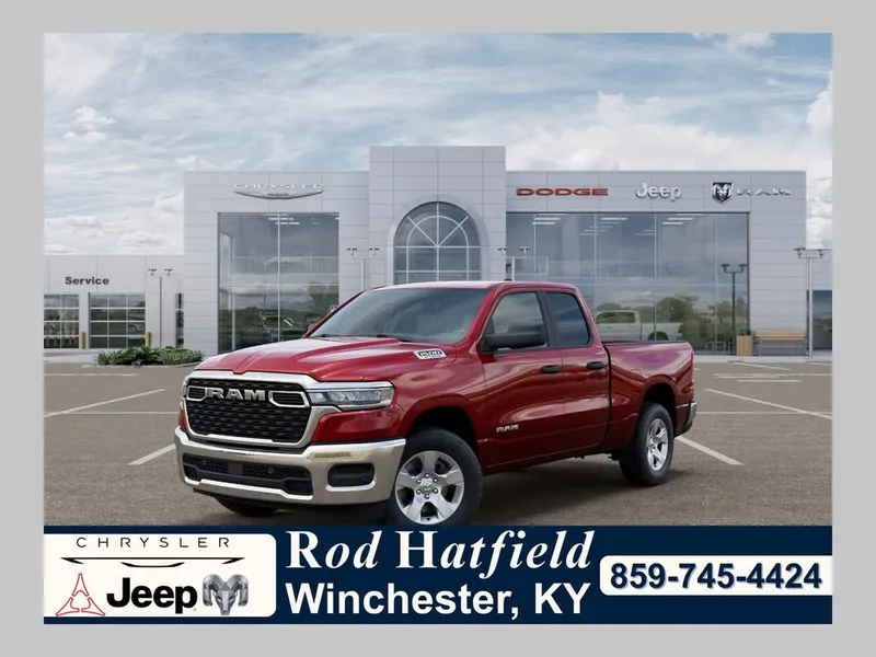 2026 RAM Ram 1500 RAM 1500 TRADESMAN QUAD CAB 4X4 6'4' BOX in Molten Red Pearl-Coat Exterior Paint — front three-quarter view
