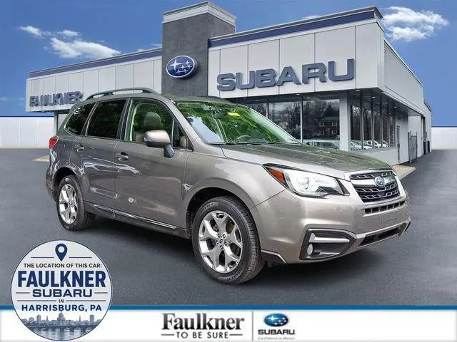 2018 Subaru Forester 2.5i Touring CVT in Sepia Bronze Metallic — front three-quarter view