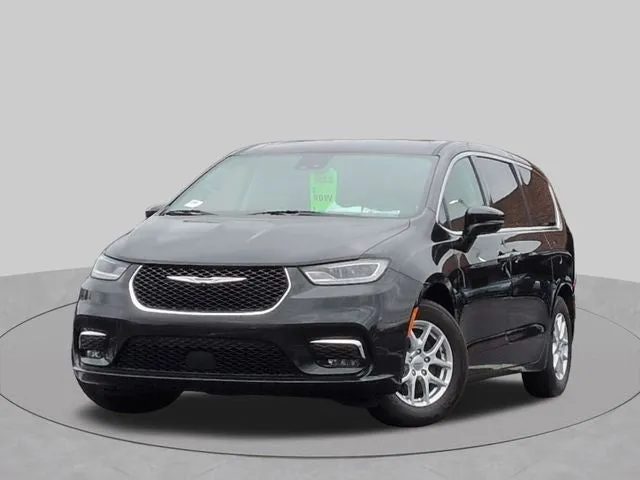 2024 Chrysler Pacifica Touring L in Brilliant Black Crystal Pearlcoat — front three-quarter view