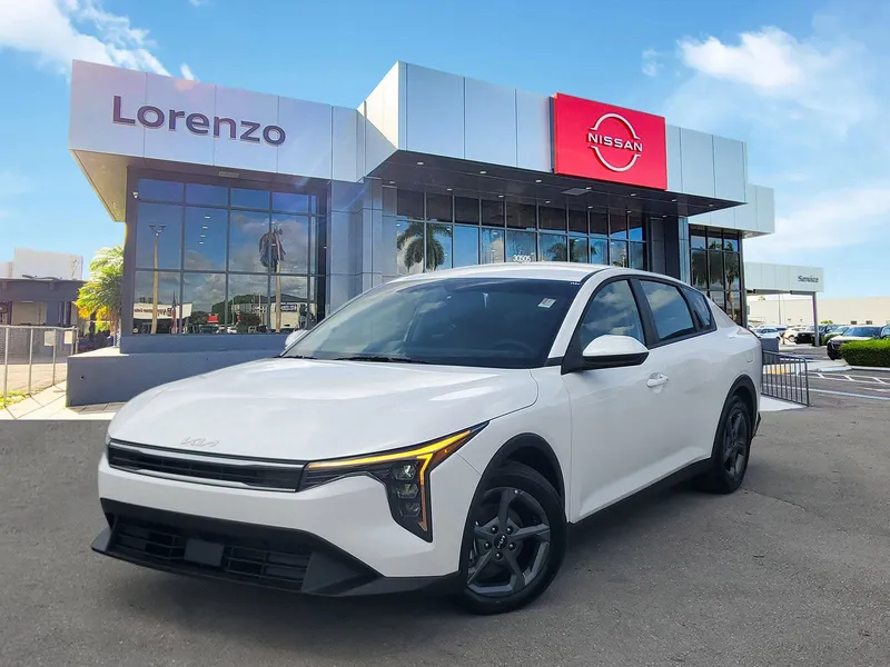 2025 Kia K4 LXS in Snow White Pearl — front three-quarter view