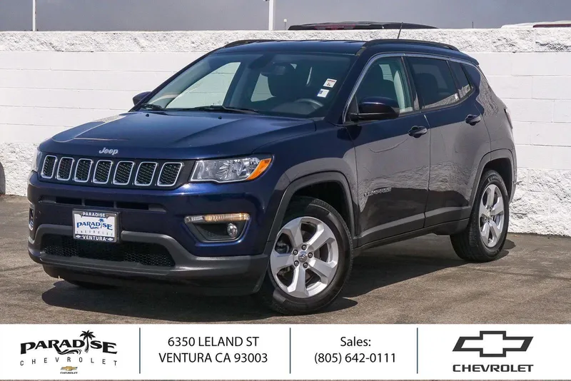 2021 Jeep Compass Latitude in Jazz Blue Pearlco — front three-quarter view