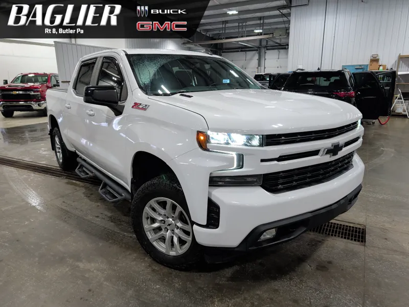 2021 Chevrolet Silverado 1500 RST in Summit White — front three-quarter view