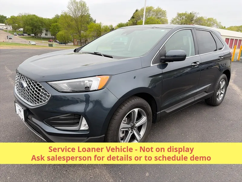 2024 Ford Edge SEL AWD in Stone Blue Metallic — front three-quarter view
