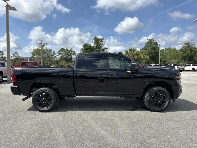 2026 RAM 2500 Big Horn in Diamond Black Crystal Pearlcoat — front three-quarter view