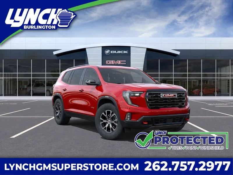 2026 GMC Acadia AT4 in Volcanic Red Tintcoat — front three-quarter view