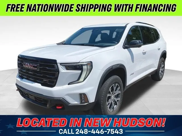 2024 GMC Acadia AT4 in Summit White — front three-quarter view