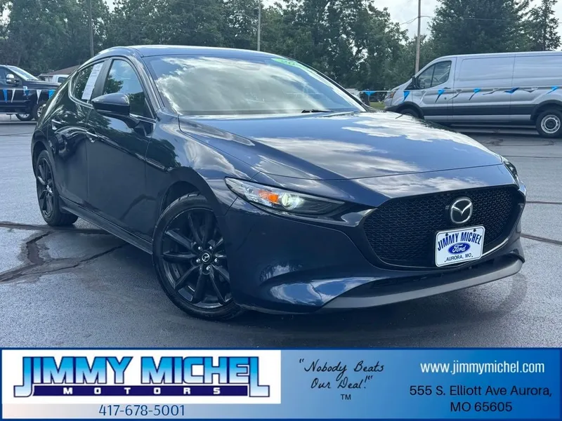 2024 Mazda Mazda3 2.5 S Select Sport in Deep Crystal Blue Mica — front three-quarter view
