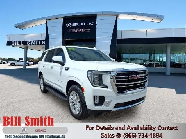 2023 GMC Yukon SLT in Summit White — front three-quarter view