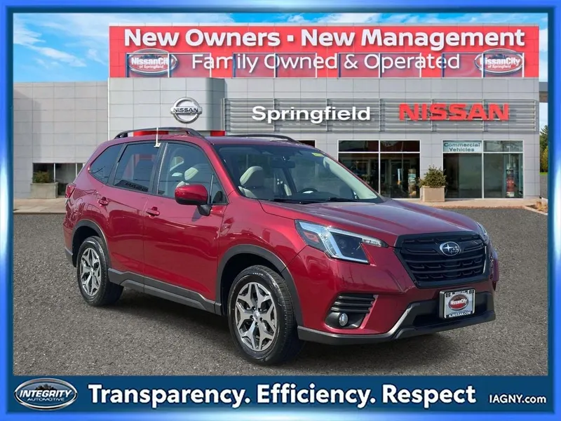 2023 Subaru Forester Premium in Crimson Red Pearl — front three-quarter view