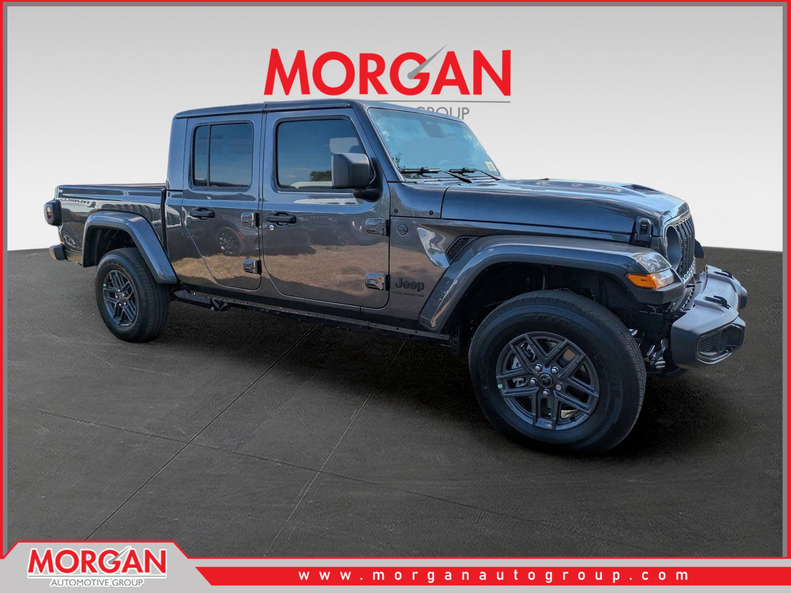 2026 Jeep Gladiator Sport S in Gray — front three-quarter view